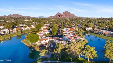 Welcome to this charming single-level home, nestled on the lake on Arizona Biltmore Golf and Country Club in Arizona - for sale on GolfHomes.com, golf home, golf lot