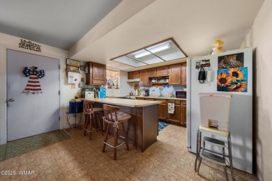 Escape to the tranquility of the countryside with this beautiful on Silver Creek Golf Club in Arizona - for sale on GolfHomes.com, golf home, golf lot
