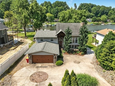 Welcome to your waterside retreat at Lake Mohawk! This on Lake Mohawk Golf Club in Ohio - for sale on GolfHomes.com, golf home, golf lot