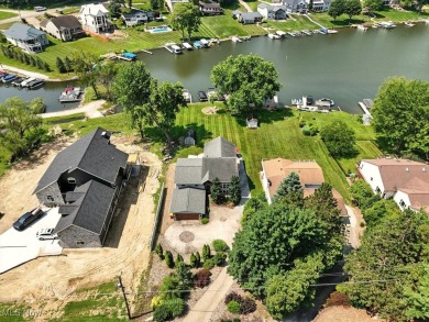 Welcome to your waterside retreat at Lake Mohawk! This on Lake Mohawk Golf Club in Ohio - for sale on GolfHomes.com, golf home, golf lot