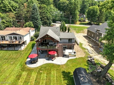 Welcome to your waterside retreat at Lake Mohawk! This on Lake Mohawk Golf Club in Ohio - for sale on GolfHomes.com, golf home, golf lot