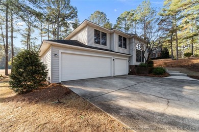 Experience modern living in this contemporary split-level home on Deercroft Golf and Country Club in North Carolina - for sale on GolfHomes.com, golf home, golf lot