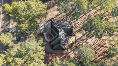 Experience modern living in this contemporary split-level home on Deercroft Golf and Country Club in North Carolina - for sale on GolfHomes.com, golf home, golf lot