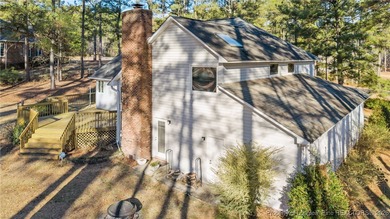 Experience modern living in this contemporary split-level home on Deercroft Golf and Country Club in North Carolina - for sale on GolfHomes.com, golf home, golf lot