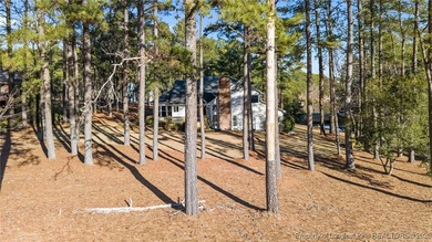 Experience modern living in this contemporary split-level home on Deercroft Golf and Country Club in North Carolina - for sale on GolfHomes.com, golf home, golf lot