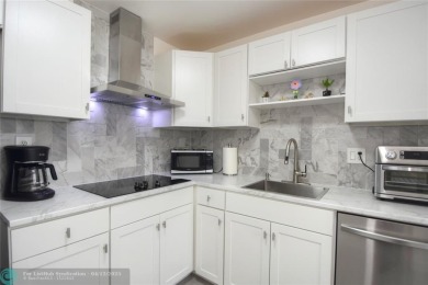This beautifully renovated condo is located in the sought after on Kings Point Golf -Flanders Way in Florida - for sale on GolfHomes.com, golf home, golf lot