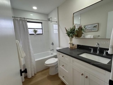 Experience the best of Dunedin living in this meticulously on The Dunedin Country Club in Florida - for sale on GolfHomes.com, golf home, golf lot