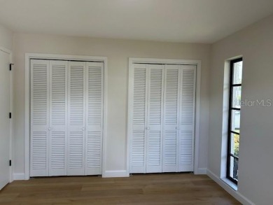 Experience the best of Dunedin living in this meticulously on The Dunedin Country Club in Florida - for sale on GolfHomes.com, golf home, golf lot