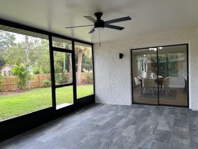 Experience the best of Dunedin living in this meticulously on The Dunedin Country Club in Florida - for sale on GolfHomes.com, golf home, golf lot