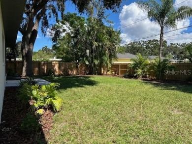 Experience the best of Dunedin living in this meticulously on The Dunedin Country Club in Florida - for sale on GolfHomes.com, golf home, golf lot