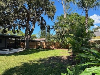 Experience the best of Dunedin living in this meticulously on The Dunedin Country Club in Florida - for sale on GolfHomes.com, golf home, golf lot