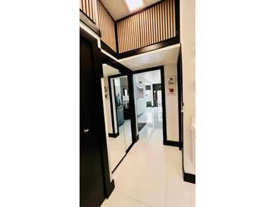 This beautifully updated and modern Executive Suite sits on an on The Great Outdoors Golf and Country Club in Florida - for sale on GolfHomes.com, golf home, golf lot