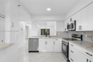 Discover this beautifully renovated 2-bedroom, 2-bathroom condo on Marina Lakes Golf Course in Florida - for sale on GolfHomes.com, golf home, golf lot