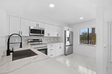 Discover this beautifully renovated 2-bedroom, 2-bathroom condo on Marina Lakes Golf Course in Florida - for sale on GolfHomes.com, golf home, golf lot