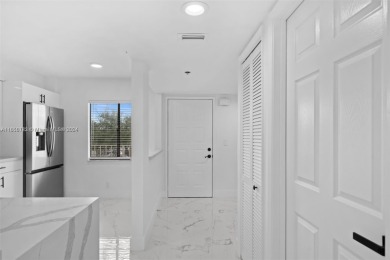 Discover this beautifully renovated 2-bedroom, 2-bathroom condo on Marina Lakes Golf Course in Florida - for sale on GolfHomes.com, golf home, golf lot