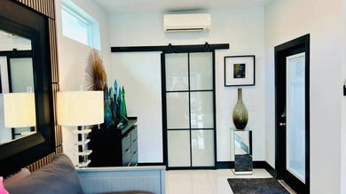 This beautifully updated and modern Executive Suite sits on an on The Great Outdoors Golf and Country Club in Florida - for sale on GolfHomes.com, golf home, golf lot