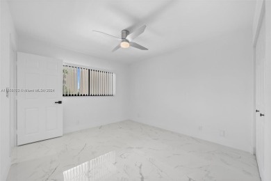 Discover this beautifully renovated 2-bedroom, 2-bathroom condo on Marina Lakes Golf Course in Florida - for sale on GolfHomes.com, golf home, golf lot