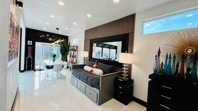 This beautifully updated and modern Executive Suite sits on an on The Great Outdoors Golf and Country Club in Florida - for sale on GolfHomes.com, golf home, golf lot