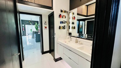 This beautifully updated and modern Executive Suite sits on an on The Great Outdoors Golf and Country Club in Florida - for sale on GolfHomes.com, golf home, golf lot