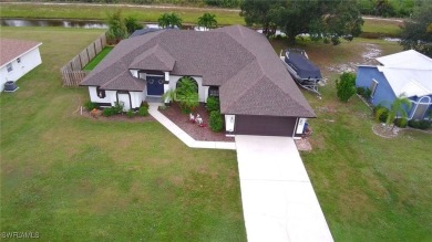 Custom built FIVE bedroom THREE bath pool home connected to on Copperhead Golf Club in Florida - for sale on GolfHomes.com, golf home, golf lot