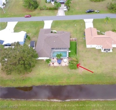Custom built FIVE bedroom THREE bath pool home connected to on Copperhead Golf Club in Florida - for sale on GolfHomes.com, golf home, golf lot