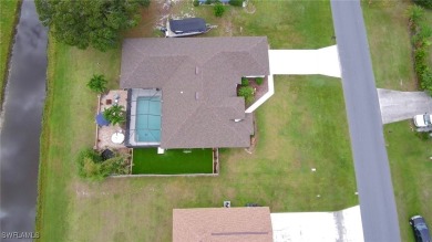 Custom built FIVE bedroom THREE bath pool home connected to on Copperhead Golf Club in Florida - for sale on GolfHomes.com, golf home, golf lot