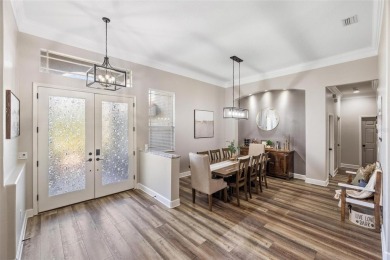 Stunning Pool Home with $200K in Thoughtful Upgrades in Gated on Stoneybrook Golf Club At Heritage Harbour in Florida - for sale on GolfHomes.com, golf home, golf lot