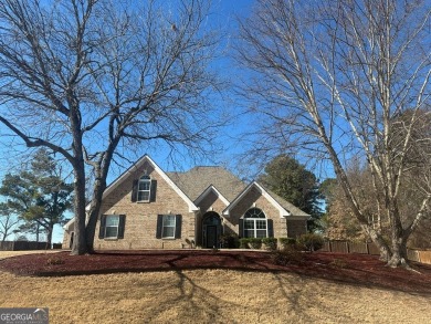 Gorgeous 4-sided brick 5 bedroom, 3.5 bathroom home on almost 1 on Cedar Lake Golf Club in Georgia - for sale on GolfHomes.com, golf home, golf lot