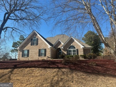 Gorgeous 4-sided brick 5 bedroom, 3.5 bathroom home on almost 1 on Cedar Lake Golf Club in Georgia - for sale on GolfHomes.com, golf home, golf lot