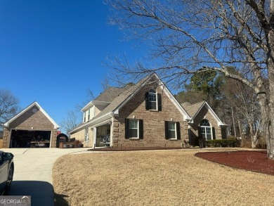 Gorgeous 4-sided brick 5 bedroom, 3.5 bathroom home on almost 1 on Cedar Lake Golf Club in Georgia - for sale on GolfHomes.com, golf home, golf lot