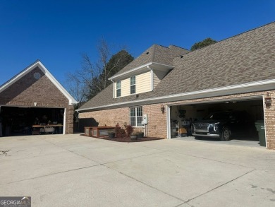 Gorgeous 4-sided brick 5 bedroom, 3.5 bathroom home on almost 1 on Cedar Lake Golf Club in Georgia - for sale on GolfHomes.com, golf home, golf lot