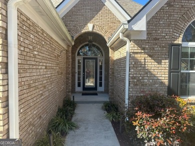 Gorgeous 4-sided brick 5 bedroom, 3.5 bathroom home on almost 1 on Cedar Lake Golf Club in Georgia - for sale on GolfHomes.com, golf home, golf lot