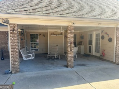 Gorgeous 4-sided brick 5 bedroom, 3.5 bathroom home on almost 1 on Cedar Lake Golf Club in Georgia - for sale on GolfHomes.com, golf home, golf lot