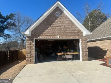 Gorgeous 4-sided brick 5 bedroom, 3.5 bathroom home on almost 1 on Cedar Lake Golf Club in Georgia - for sale on GolfHomes.com, golf home, golf lot