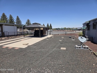 Plenty of amenities including an 18- hole Golf Course to enjoy on Juniper Ridge R.V. Golf Resort in Arizona - for sale on GolfHomes.com, golf home, golf lot