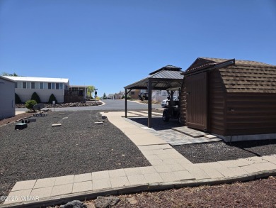 Plenty of amenities including an 18- hole Golf Course to enjoy on Juniper Ridge R.V. Golf Resort in Arizona - for sale on GolfHomes.com, golf home, golf lot