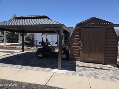Plenty of amenities including an 18- hole Golf Course to enjoy on Juniper Ridge R.V. Golf Resort in Arizona - for sale on GolfHomes.com, golf home, golf lot