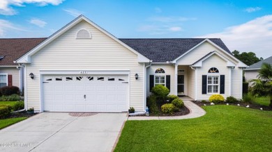 Discover this spacious 3-bedroom home with stunning pond views on Sandpiper Bay Golf and Country Club in North Carolina - for sale on GolfHomes.com, golf home, golf lot