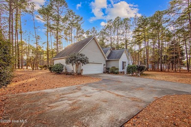 Welcome to a home where everyday living feels like a retreat on Deercroft Golf and Country Club in North Carolina - for sale on GolfHomes.com, golf home, golf lot