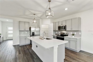 Modern comfort meets exceptional community living in this on Esplanade Golf and Country at Lakewood Ranch in Florida - for sale on GolfHomes.com, golf home, golf lot