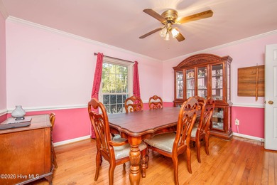 Welcome to a home where everyday living feels like a retreat on Deercroft Golf and Country Club in North Carolina - for sale on GolfHomes.com, golf home, golf lot