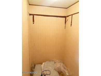 Perfect home for a project in a great location on a large lot! on Tucson Estates Golf Course in Arizona - for sale on GolfHomes.com, golf home, golf lot