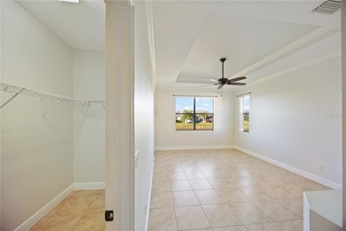 Perfectly positioned on a scenic waterway, this 2017 CUSTOM on Rotonda Golf and Country Club - Long Marsh  in Florida - for sale on GolfHomes.com, golf home, golf lot