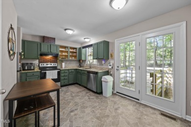 Discover your dream ranch home in this inviting lake community on River Golf and County Club at Lake Royale in North Carolina - for sale on GolfHomes.com, golf home, golf lot