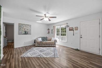 Discover your dream ranch home in this inviting lake community on River Golf and County Club at Lake Royale in North Carolina - for sale on GolfHomes.com, golf home, golf lot