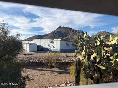 Perfect home for a project in a great location on a large lot! on Tucson Estates Golf Course in Arizona - for sale on GolfHomes.com, golf home, golf lot