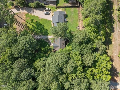 Discover your dream ranch home in this inviting lake community on River Golf and County Club at Lake Royale in North Carolina - for sale on GolfHomes.com, golf home, golf lot