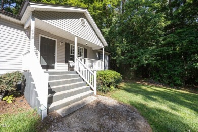 Discover your dream ranch home in this inviting lake community on River Golf and County Club at Lake Royale in North Carolina - for sale on GolfHomes.com, golf home, golf lot