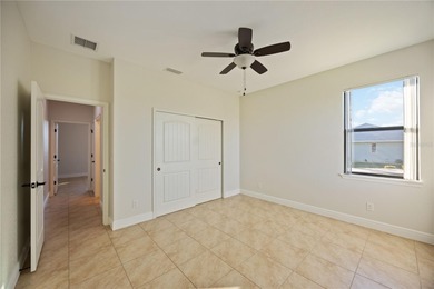 Perfectly positioned on a scenic waterway, this 2017 CUSTOM on Rotonda Golf and Country Club - Long Marsh  in Florida - for sale on GolfHomes.com, golf home, golf lot