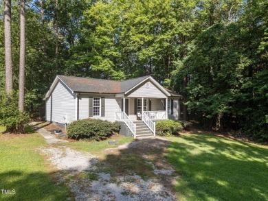 Discover your dream ranch home in this inviting lake community on River Golf and County Club at Lake Royale in North Carolina - for sale on GolfHomes.com, golf home, golf lot